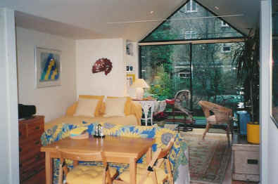 Highbury self catering studio living room looking onto garden
